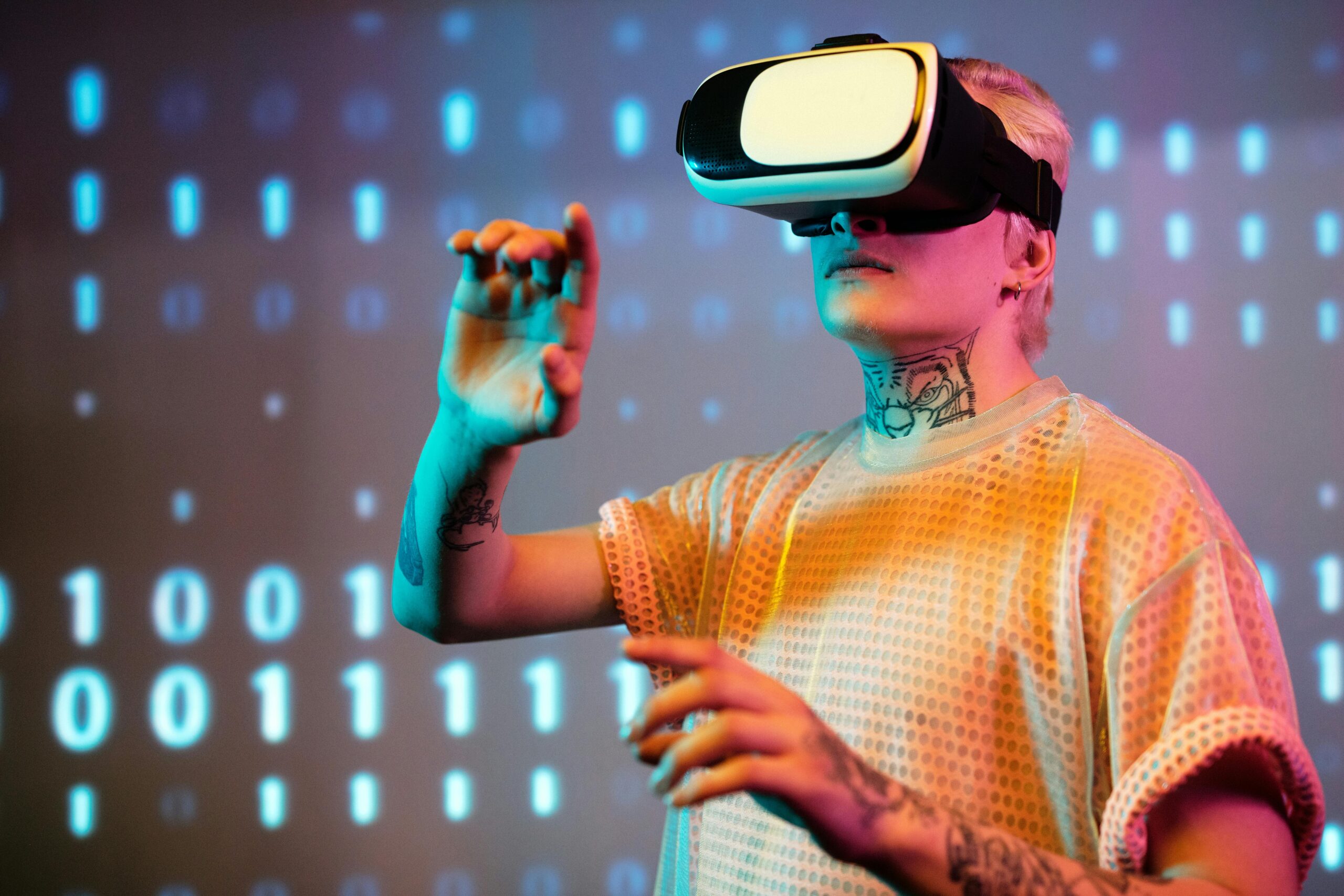 Home A young man interacts in virtual reality wearing a headset with a digital binary background.